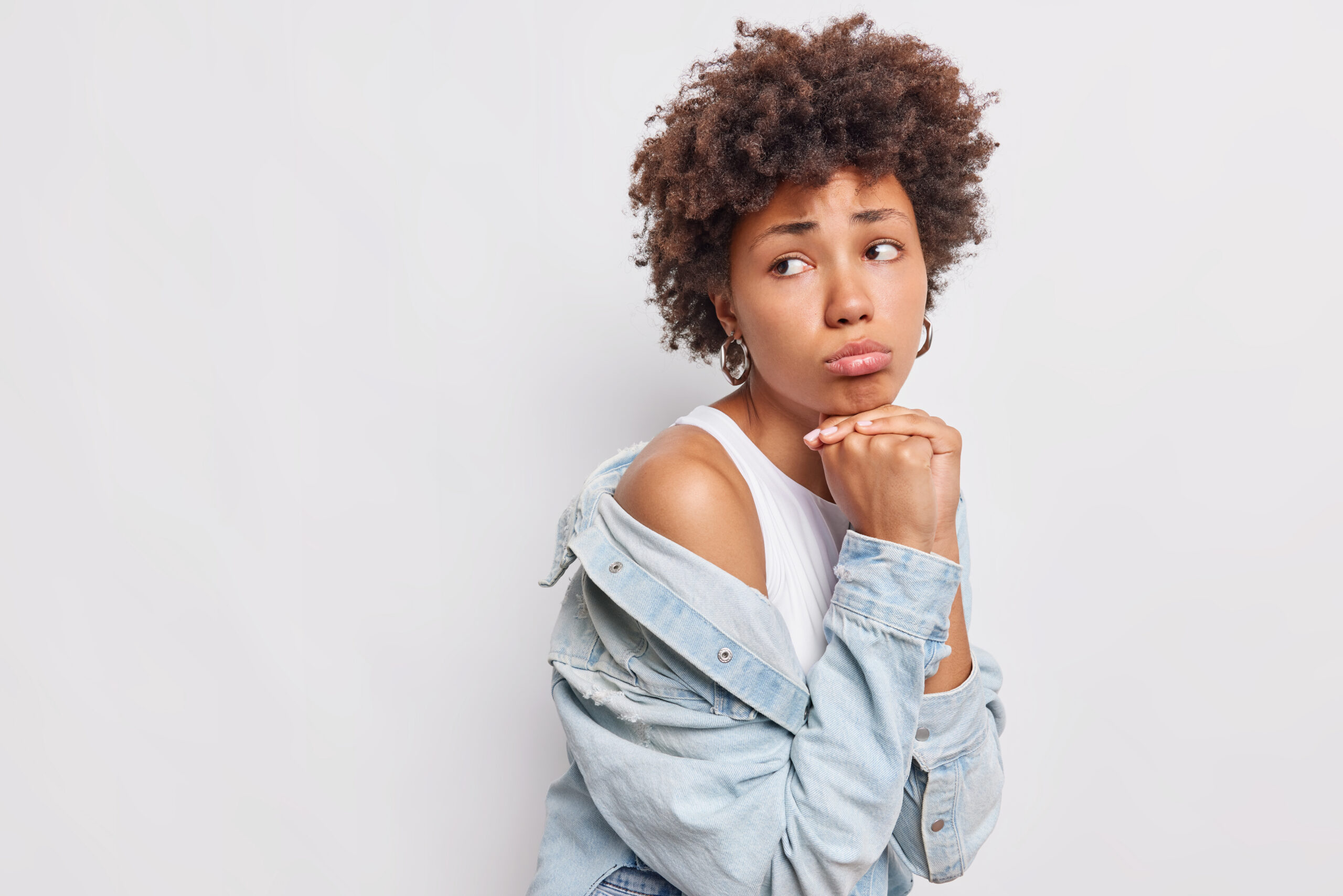 Woman looking away in a studio portrait